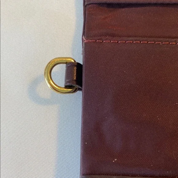 TUMI Dark Red Leather Wallet with Gold Accents - Picture 3 of 10